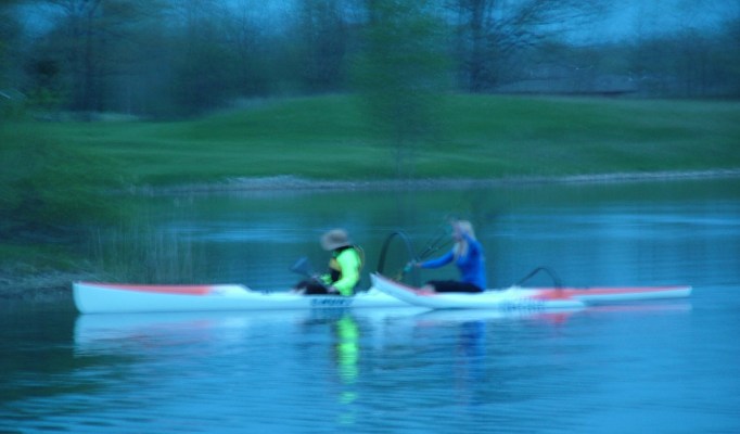Julie and Kinsey cruising along in the tandem  outrigger canoe!  