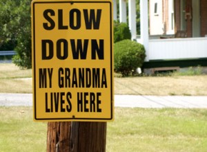 slow but sure, slowly but surely, senior crossing, traffic sign, grandma, grandmother, sign