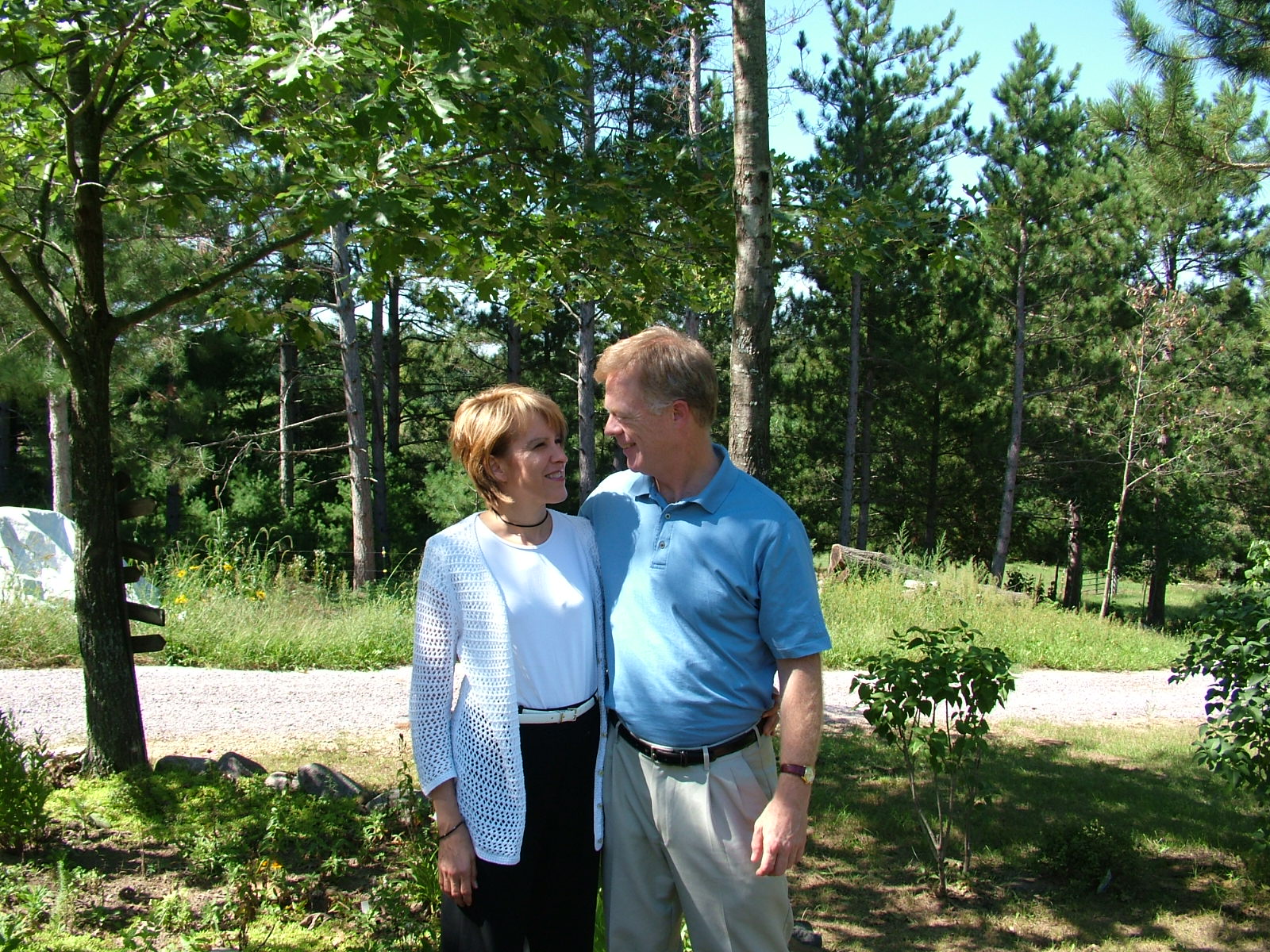 couple, Christian, husband and wife, Wisconsin, visiting, friends, woods, Fall, sunny day, engaged