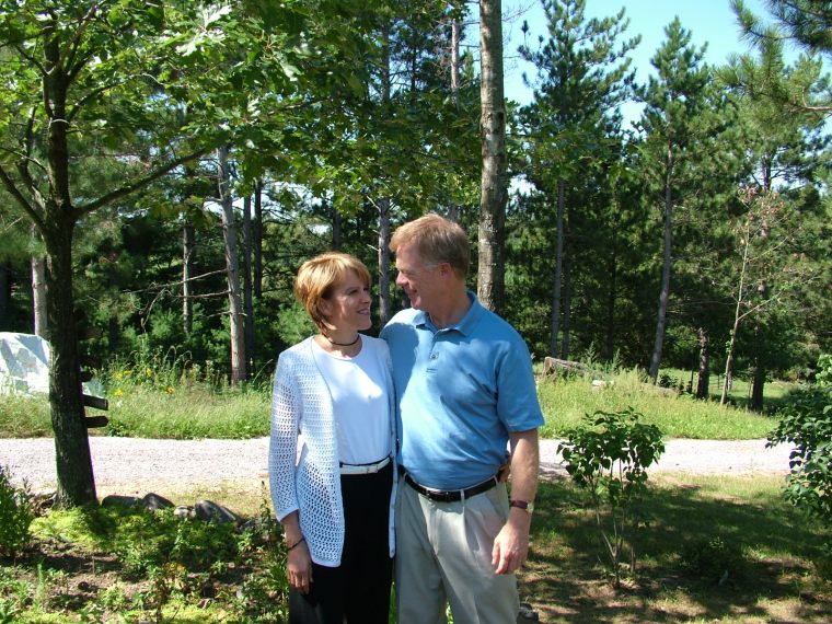 couple, Christian, husband and wife, Wisconsin, visiting, friends, woods, Fall, sunny day, engaged