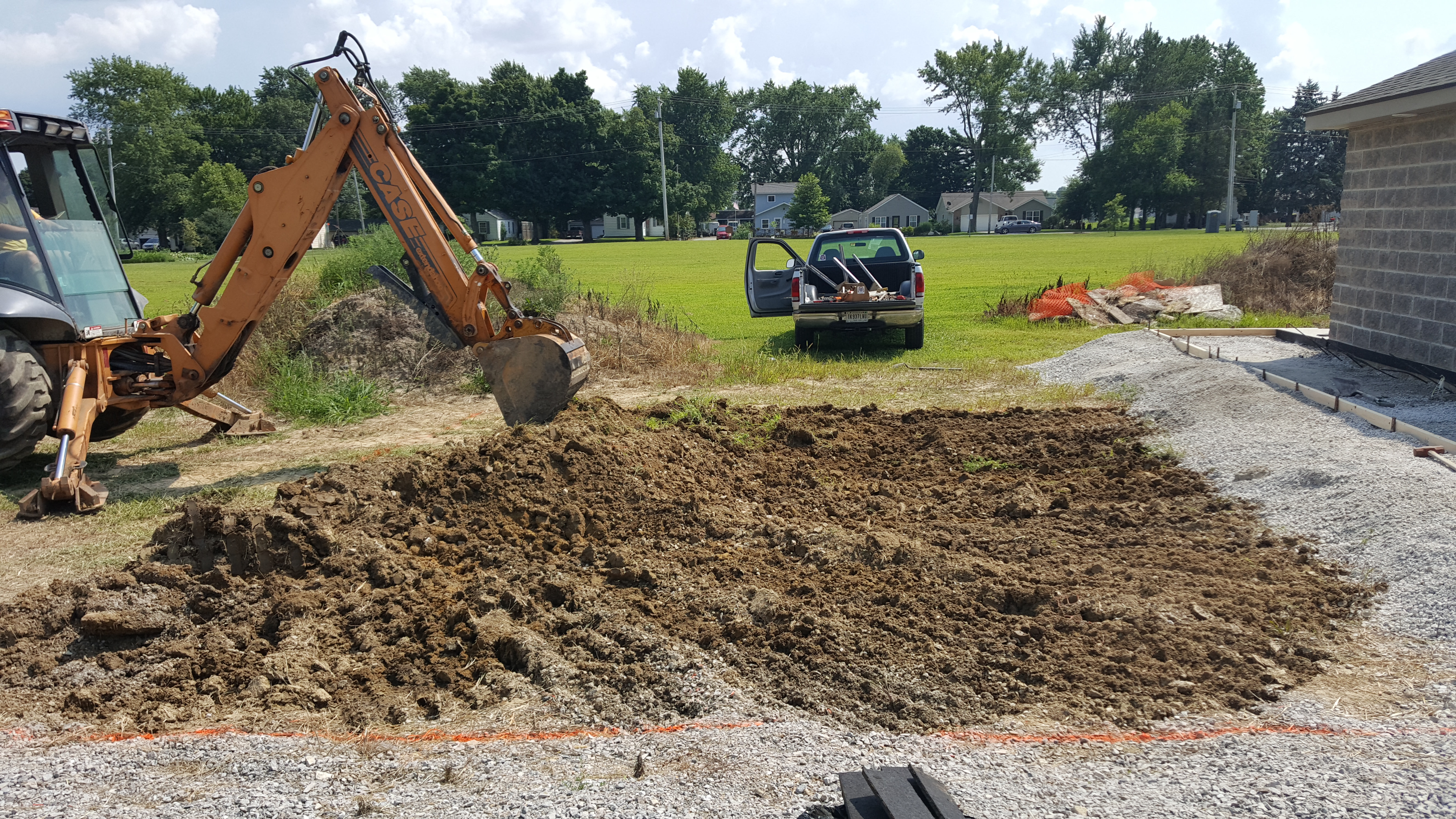Kubota, rain garden, community, project, Huntertown, family, park, runoff, storm water, digging, construction, volunteers